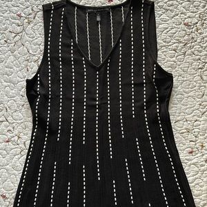 White House black market sleeves less top size small